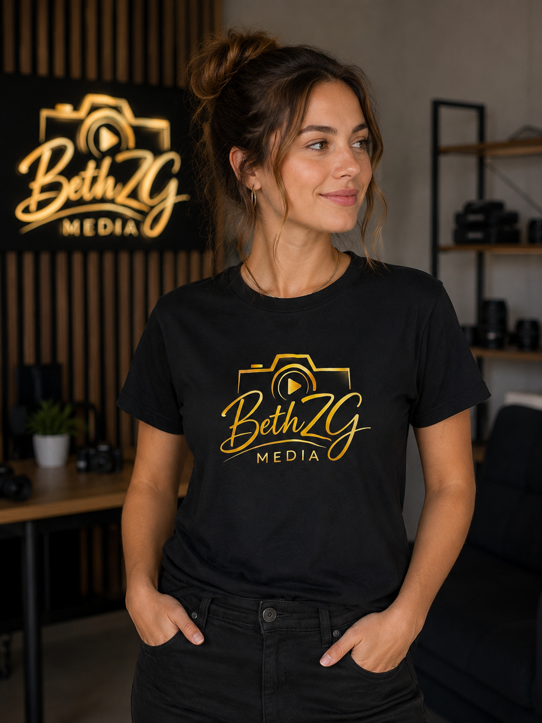 Woman wearing custom black BethZG Media logo t-shirt.
